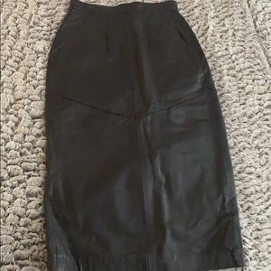 Long, pencil leather skirt by Evan Davies